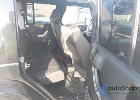 2013 Jeep Wrangler Unlimited Sahara из США, поврежденный, VIN 1C4BJWEG2DL609786